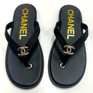 CHANEL Logo Flip Flops in Black/Gold